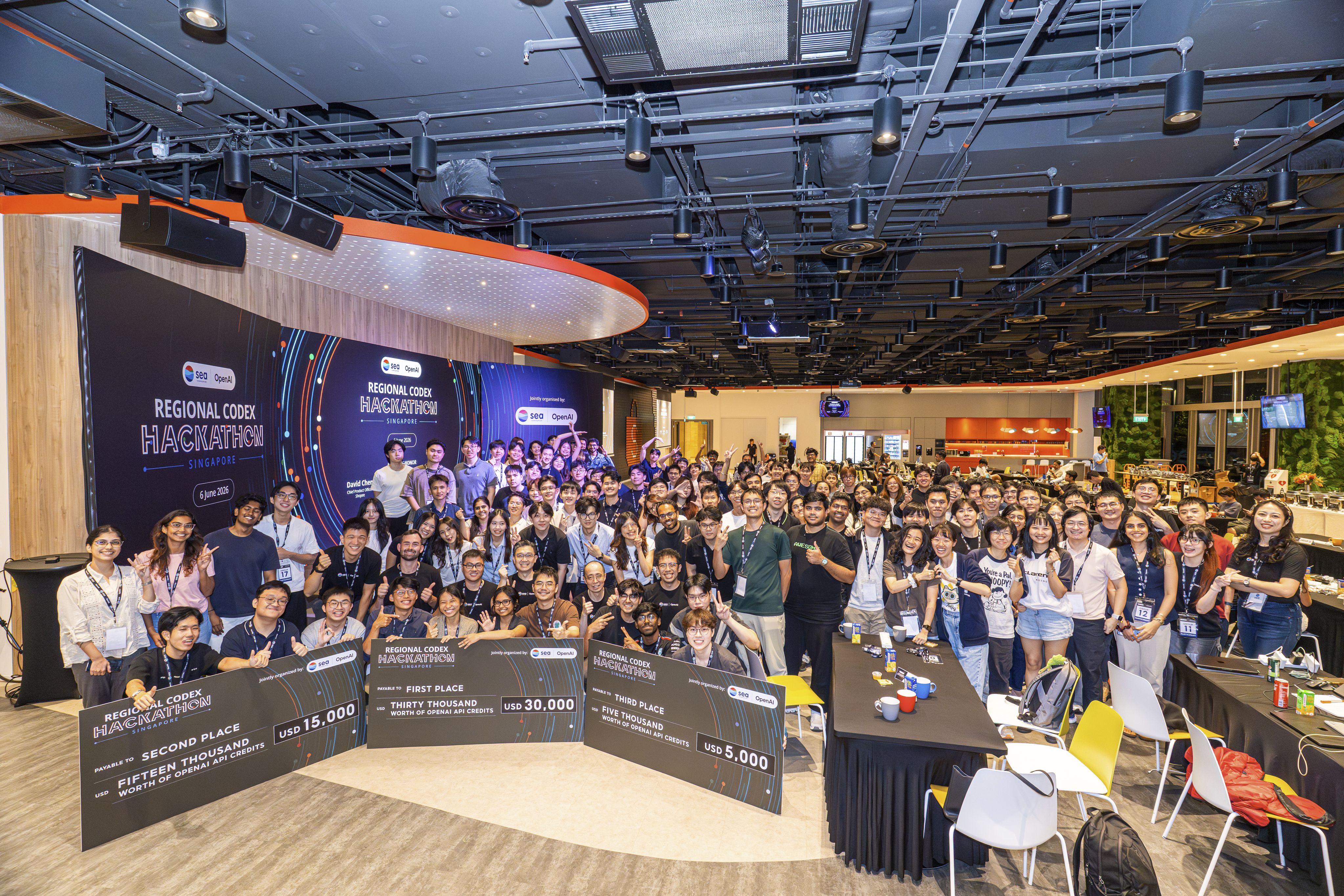 Group photo of participants on stage at the Regional Codex Hackathon, Singapore